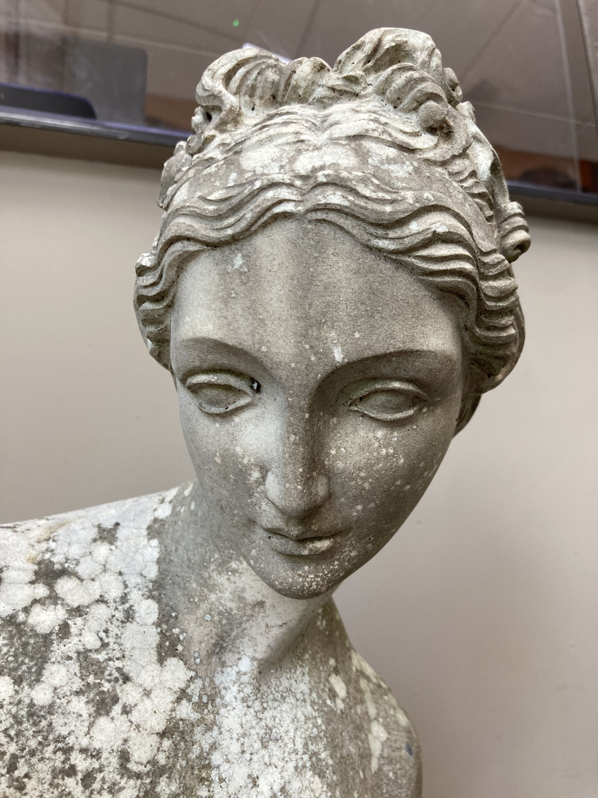 A cast stone garden ornament of Venus, height 118cm